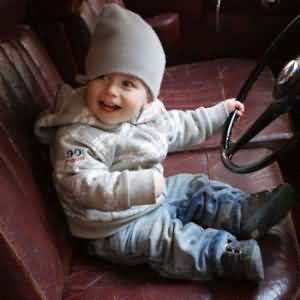 Young boy in the Bentley